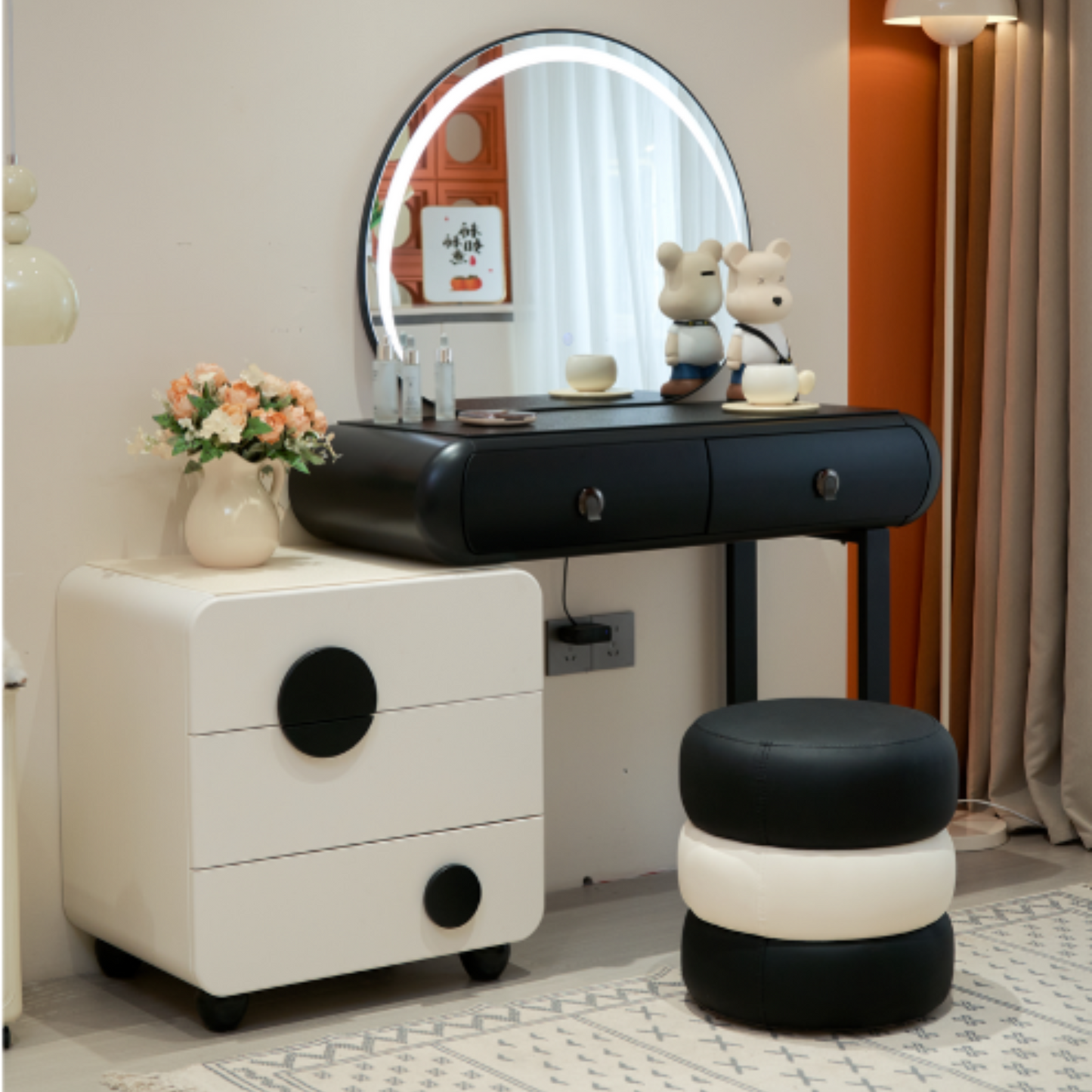 Dressing table with mirror, stool, and decorative items in a room setting.