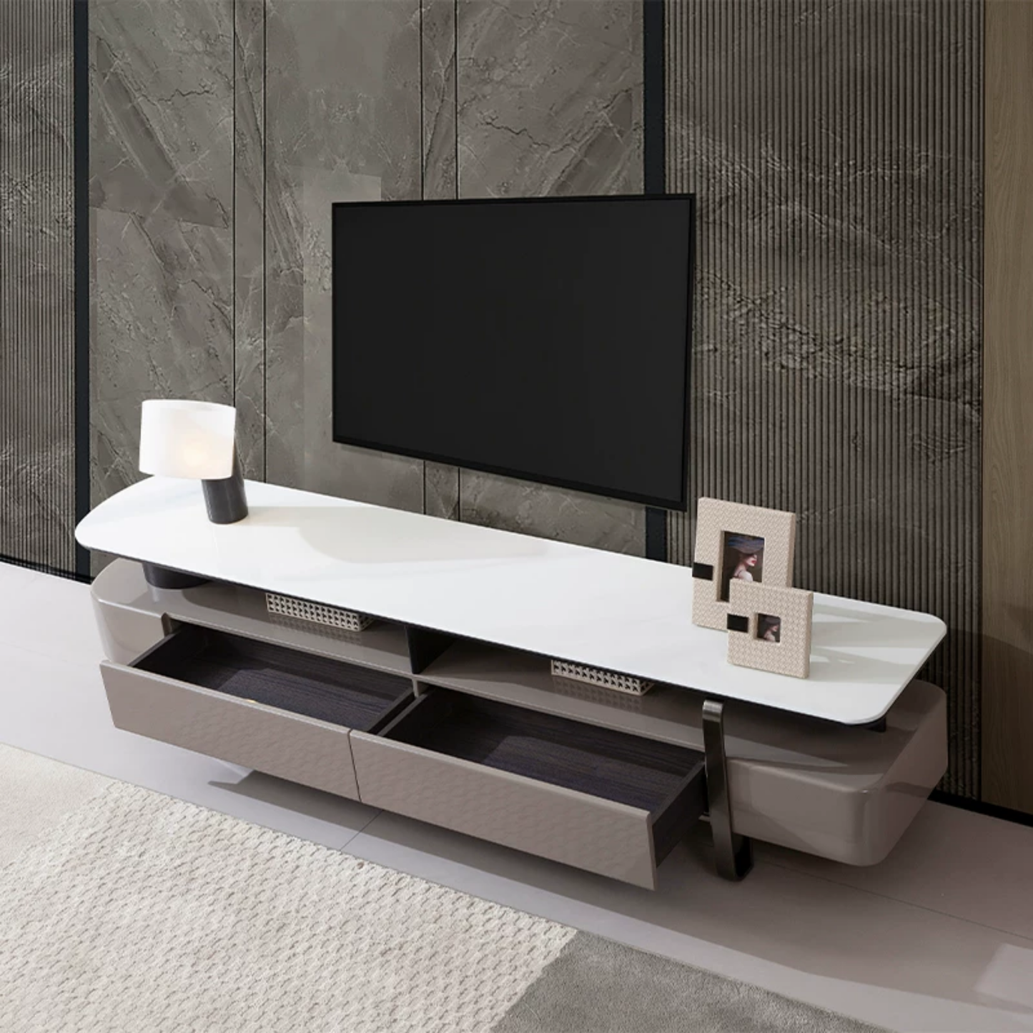 Modern TV stand with a television mounted on a textured wall.