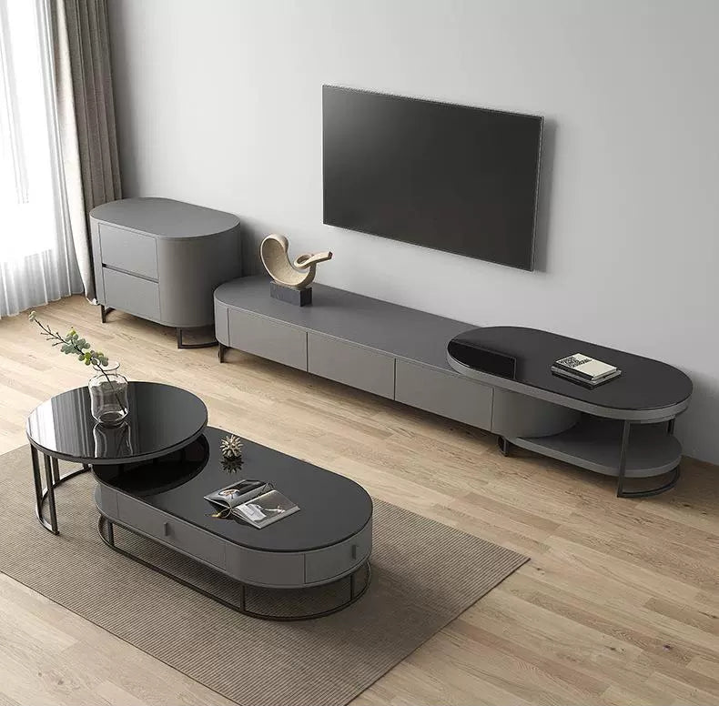 Modern living room with gray TV stand and coffee table.