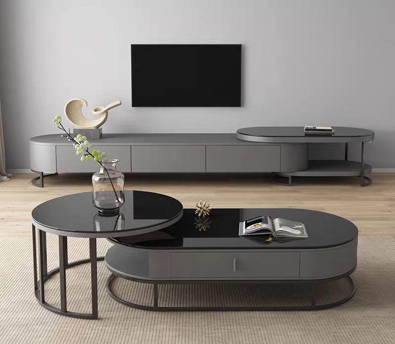 Modern living room setup with a television, coffee table, and sideboard.