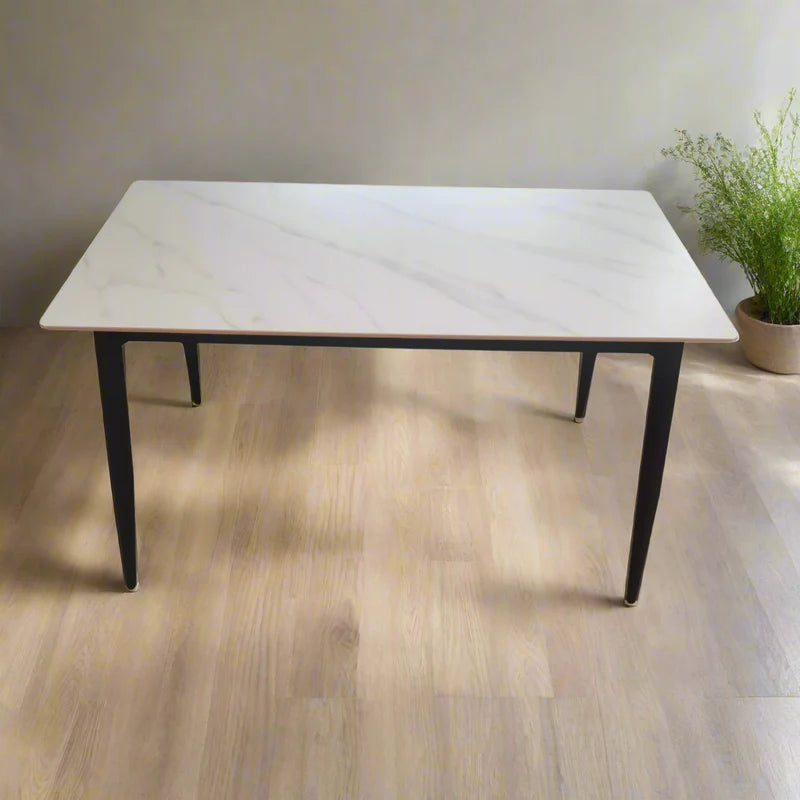 Front view of Modern Snow White Marble Dining Table with slim black legs – Model 74001A