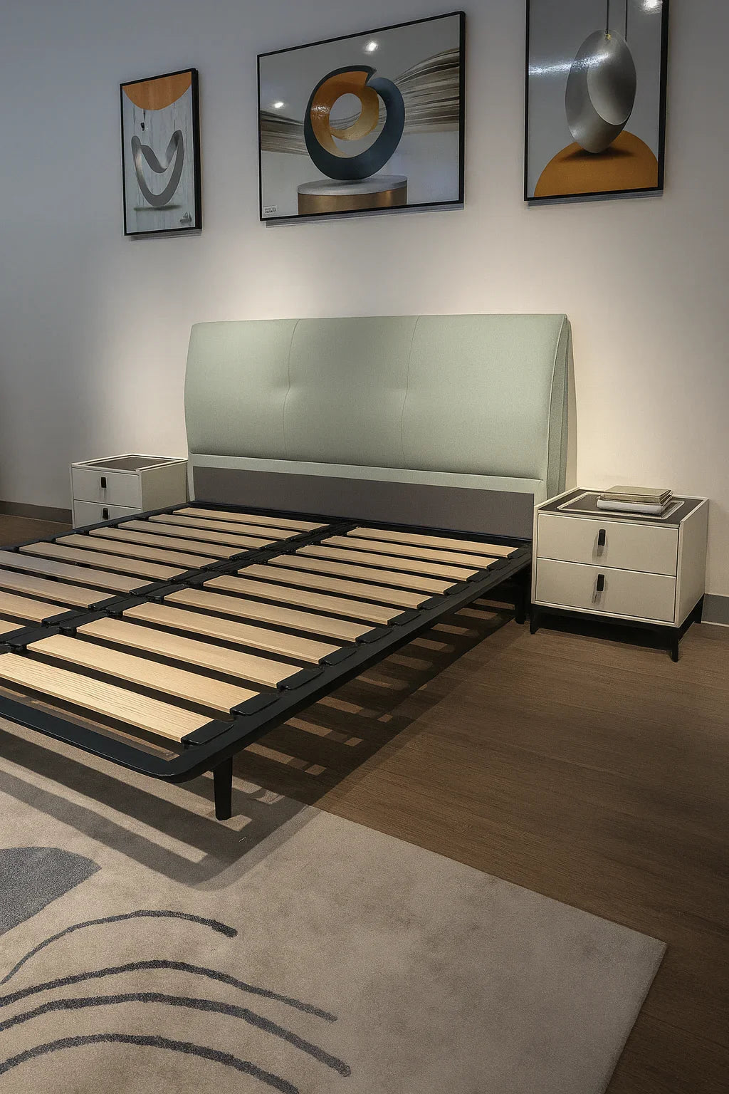 Modern pastel green upholstered bed with black legs