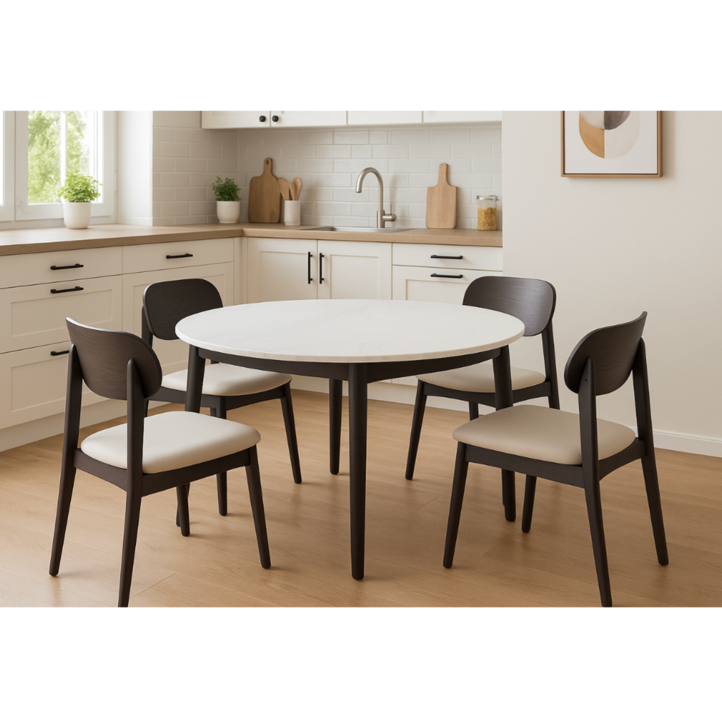 Round dining table with four chairs in a kitchen setting