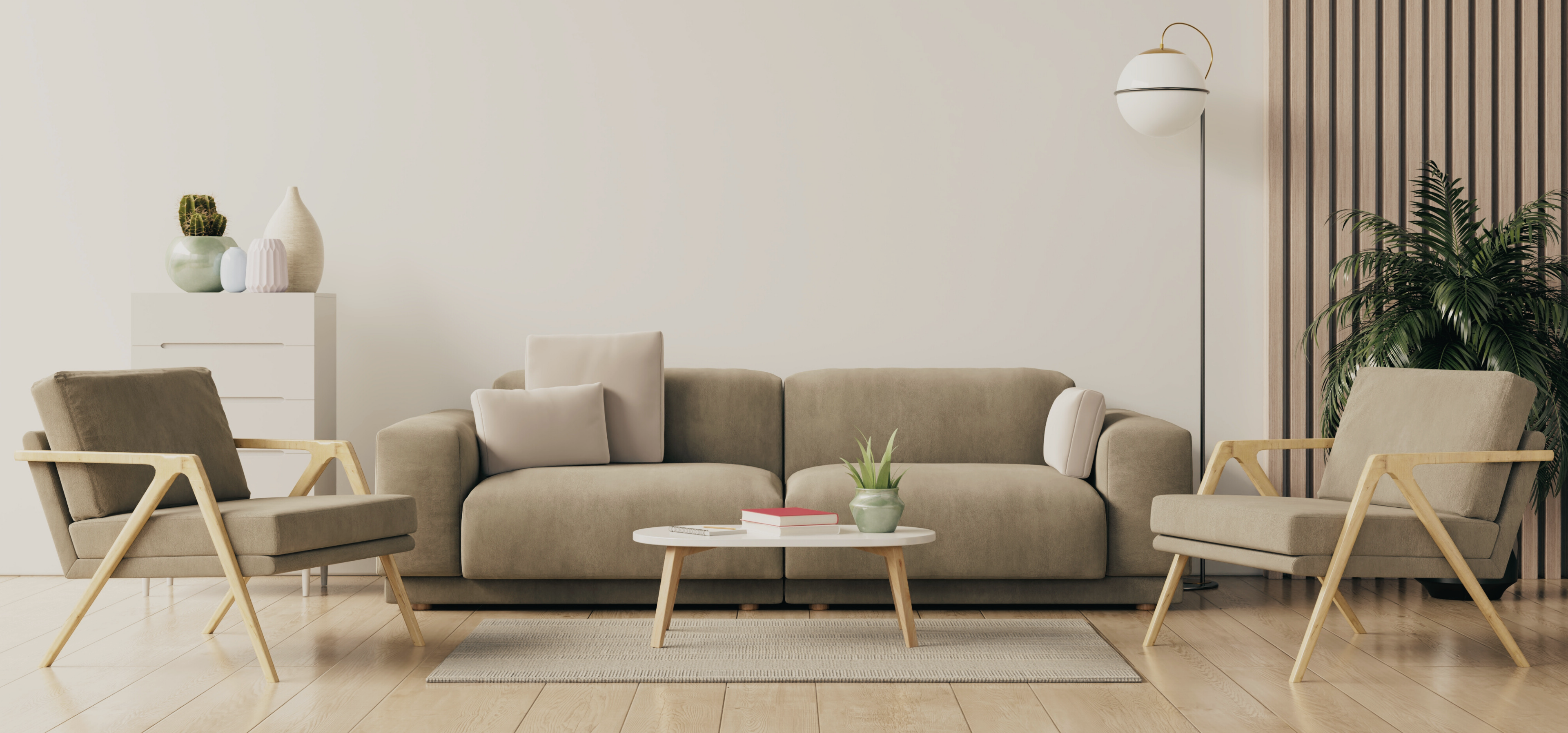 Modern living room with beige sofa, armchairs, and a coffee table.