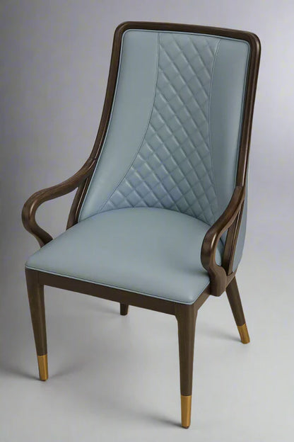 Front view of classic blue PU leather dining chair with quilted diamond stitching, wooden armrests, and gold-tipped legs