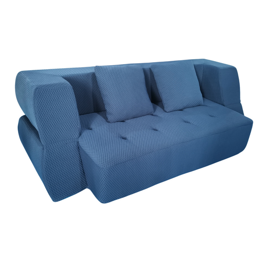 Blue sofa with textured pattern on a white background