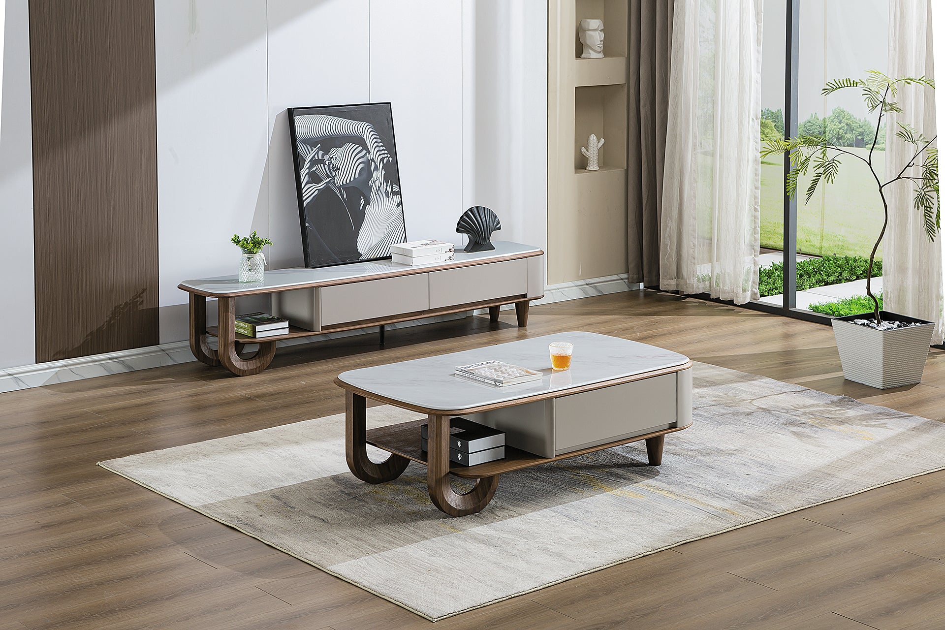 Modern living room with a coffee table, TV stand, and decorative items.