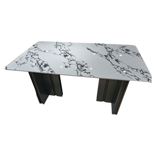 Dining table with marble-like top and dark metal legs on a white background