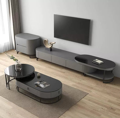 Modern living room with gray TV stand and coffee table.