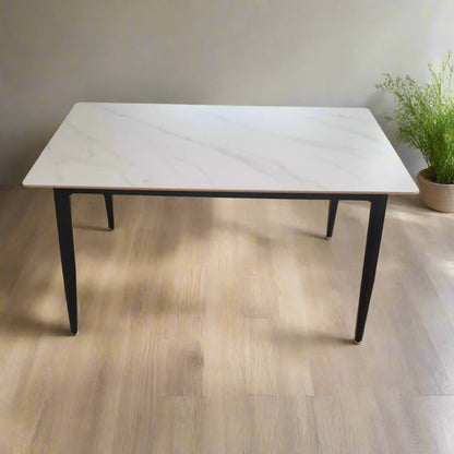 Front view of Modern Snow White Marble Dining Table with slim black legs – Model 74001A