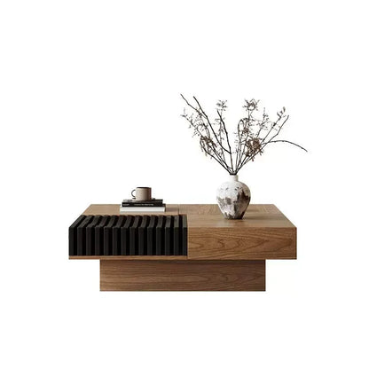 Wooden coffee table with decorative items on a white background