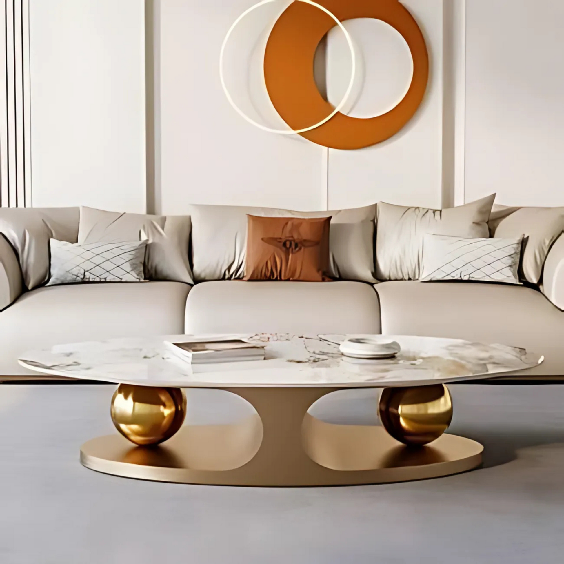 Marble coffee table with gold spherical bases on a white background