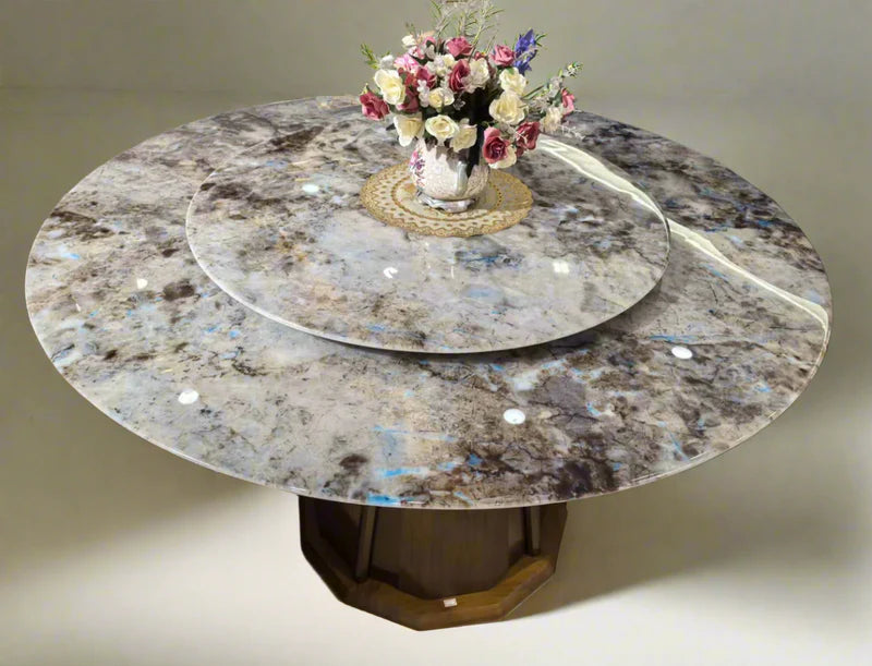 Angled view of luxury round marble dining table with rotating Lazy Susan, solid and engineered wood base, and ash veneer finish