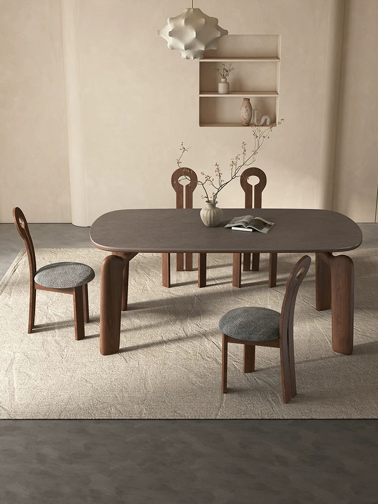 Dining table with chairs in a room setting