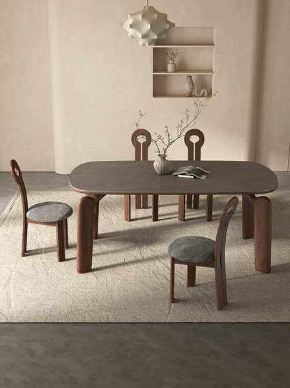 Dining table with chairs in a room setting