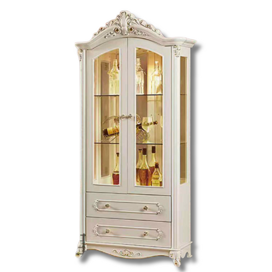 Decorative white cabinet with glass doors displaying bottles on a white background
