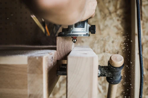 Wood in a clamp showing careful designer furniture craftsmanship